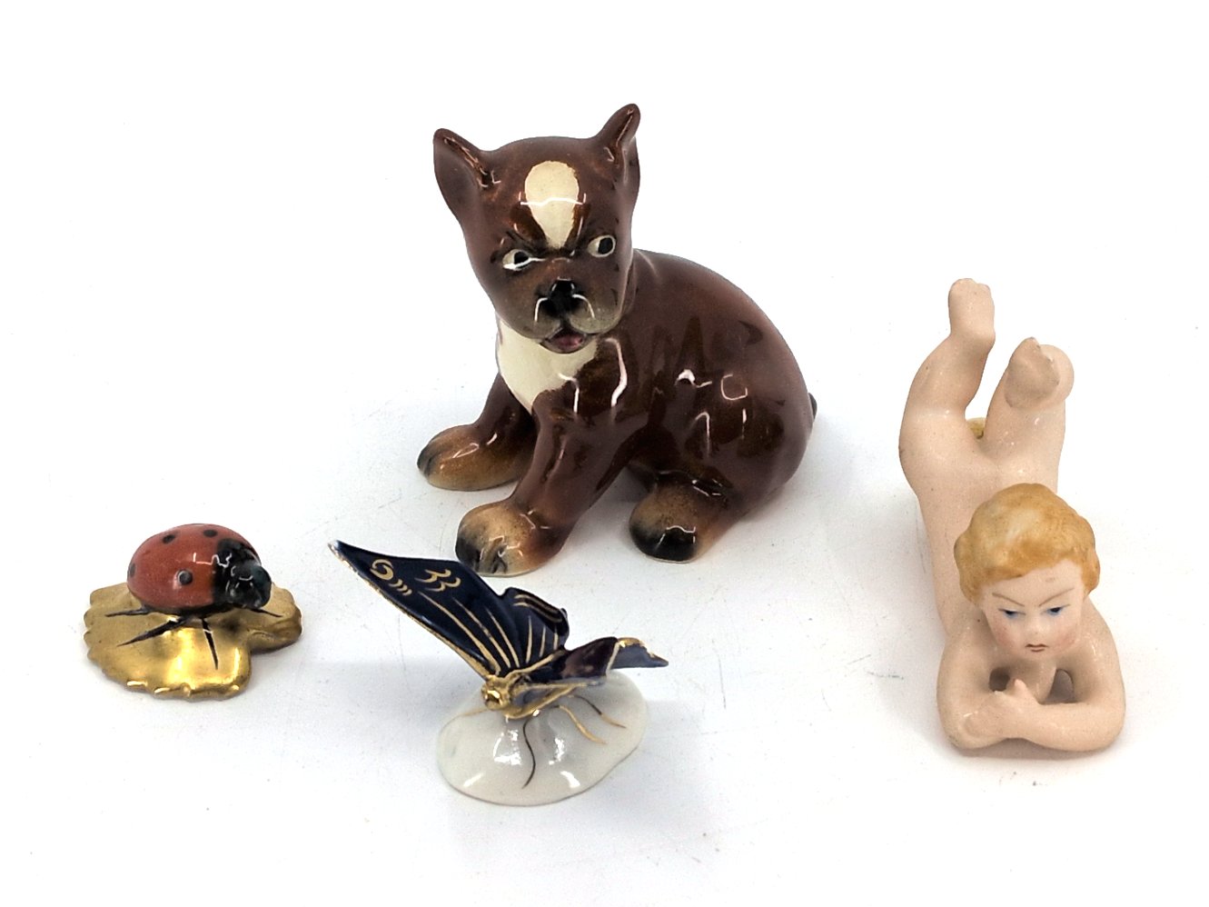 Los 63 – 4 kleine Porzellanfiguren u. a. Ens