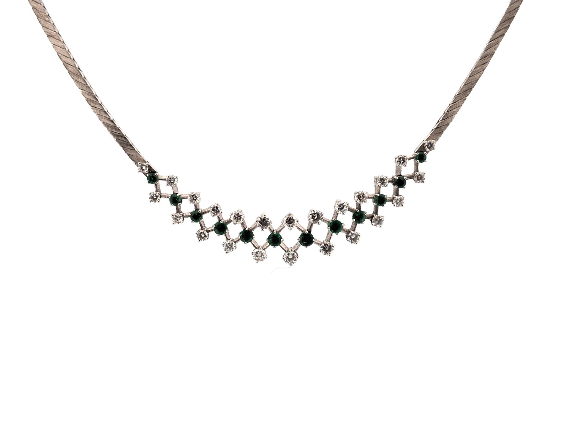 1 necklace, white gold 750, 24 brilliants, 12 emeralds total approx. 2.35 ct