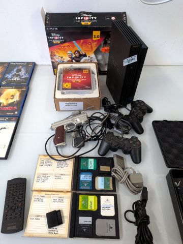 1 PlayStation 2 + Zubehör